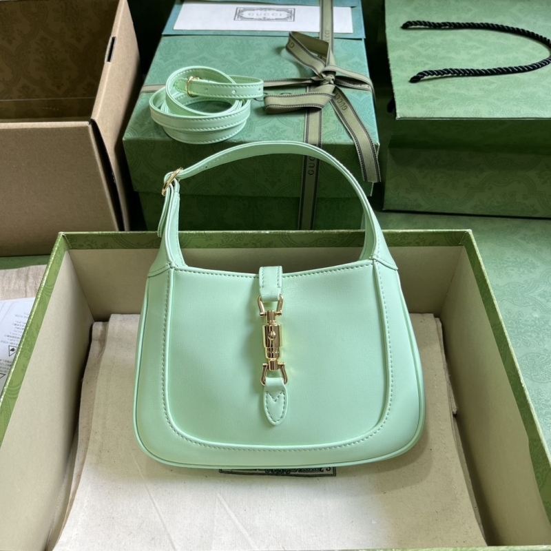 G*u*i top handle bags